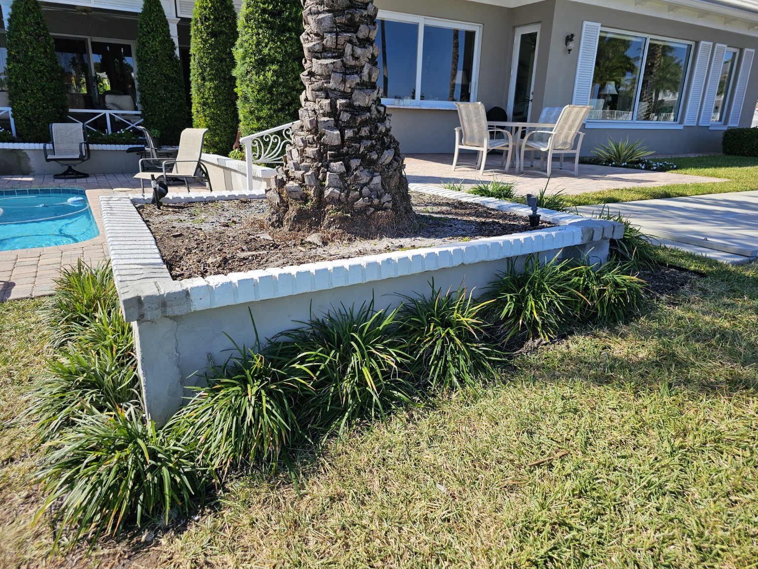 Repaired coastal garden wall in Boca Raton