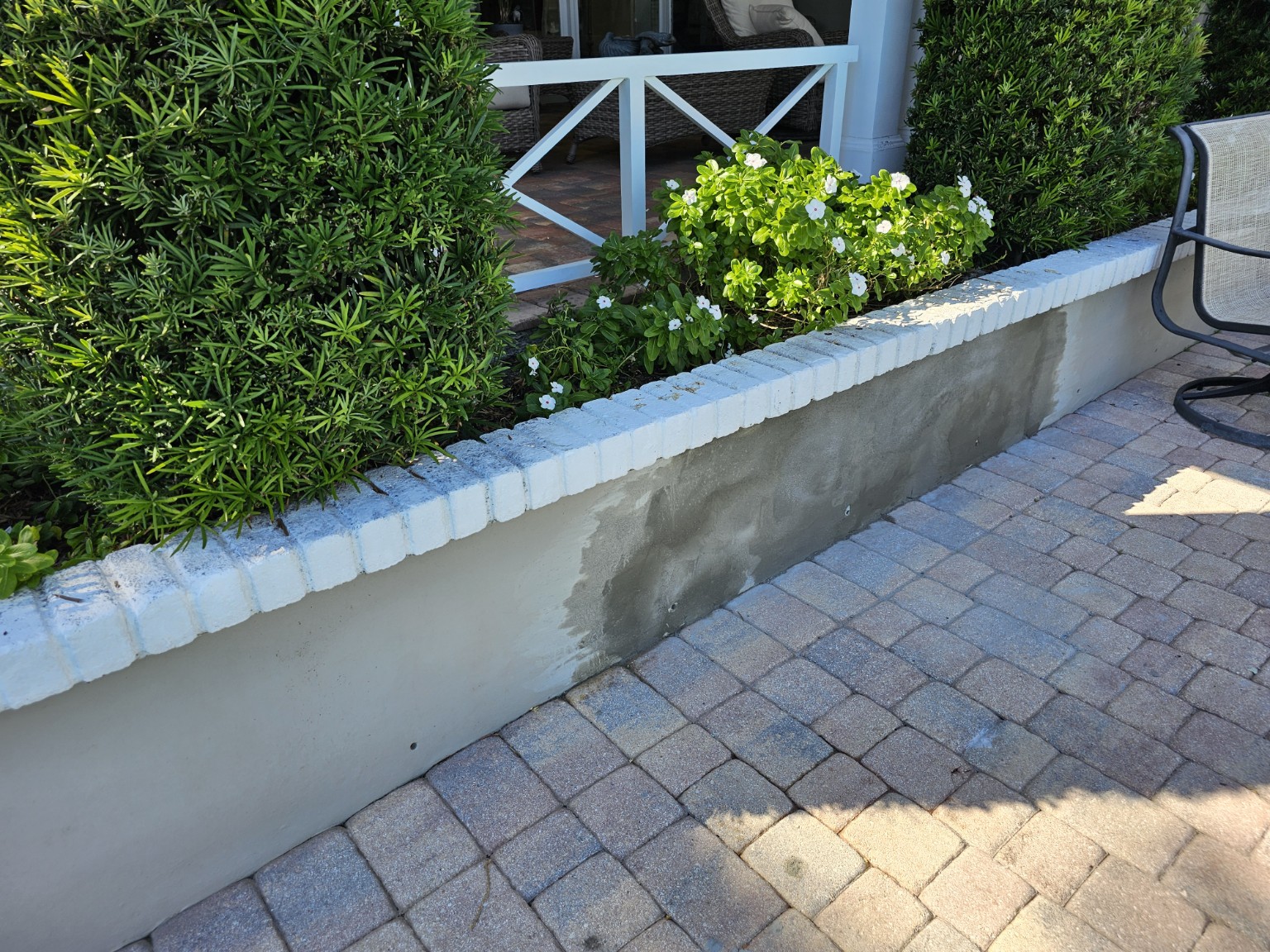 Stucco garden wall during surface repair